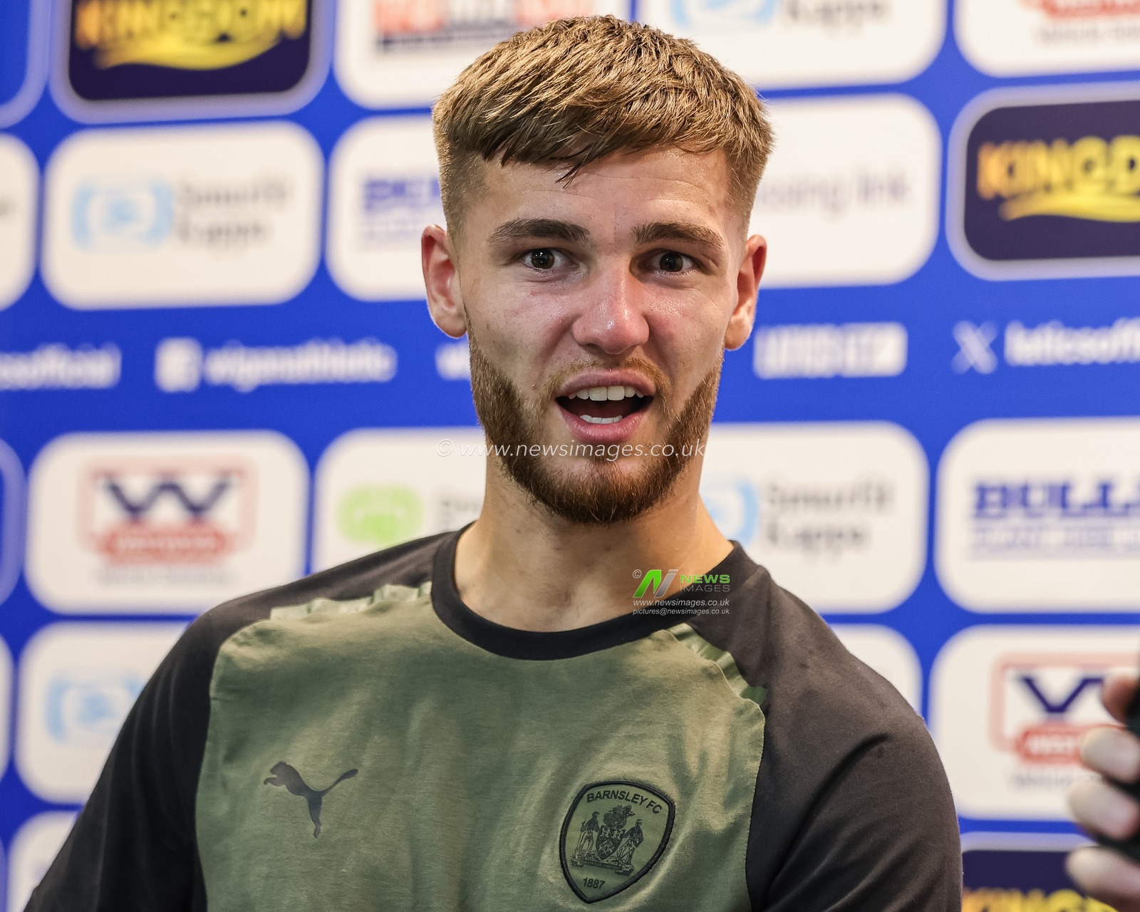 John Mcatee #45 of Barnsley speaks in the post match press conference during the Sky Bet League 1 match Wigan Athletic vs Barnsley at DW Stadium, Wigan, United Kingdom, 26th August 2023

(Photo by Mark Cosgrove/News Images)