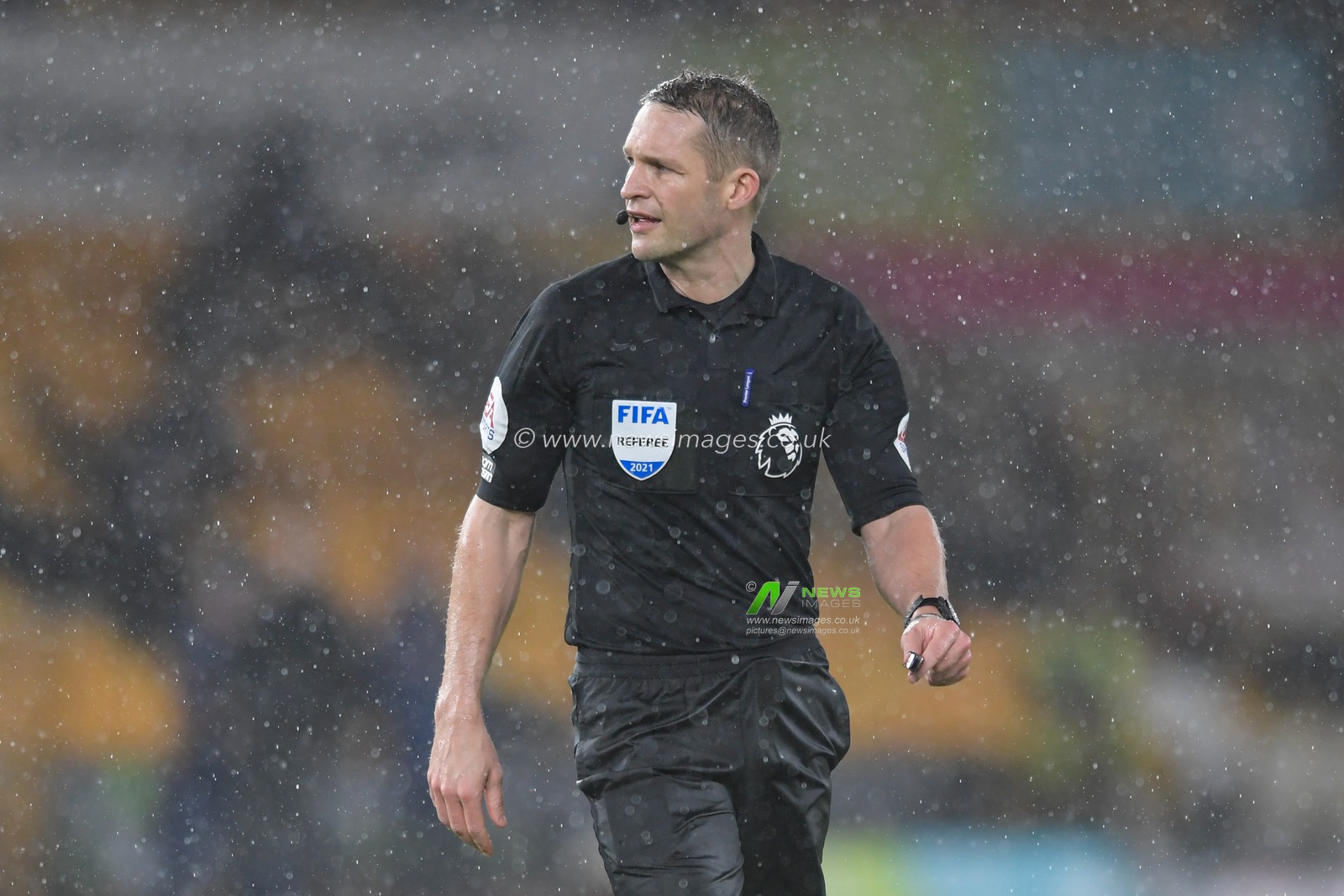 Referee Craig Pawson in action during the game