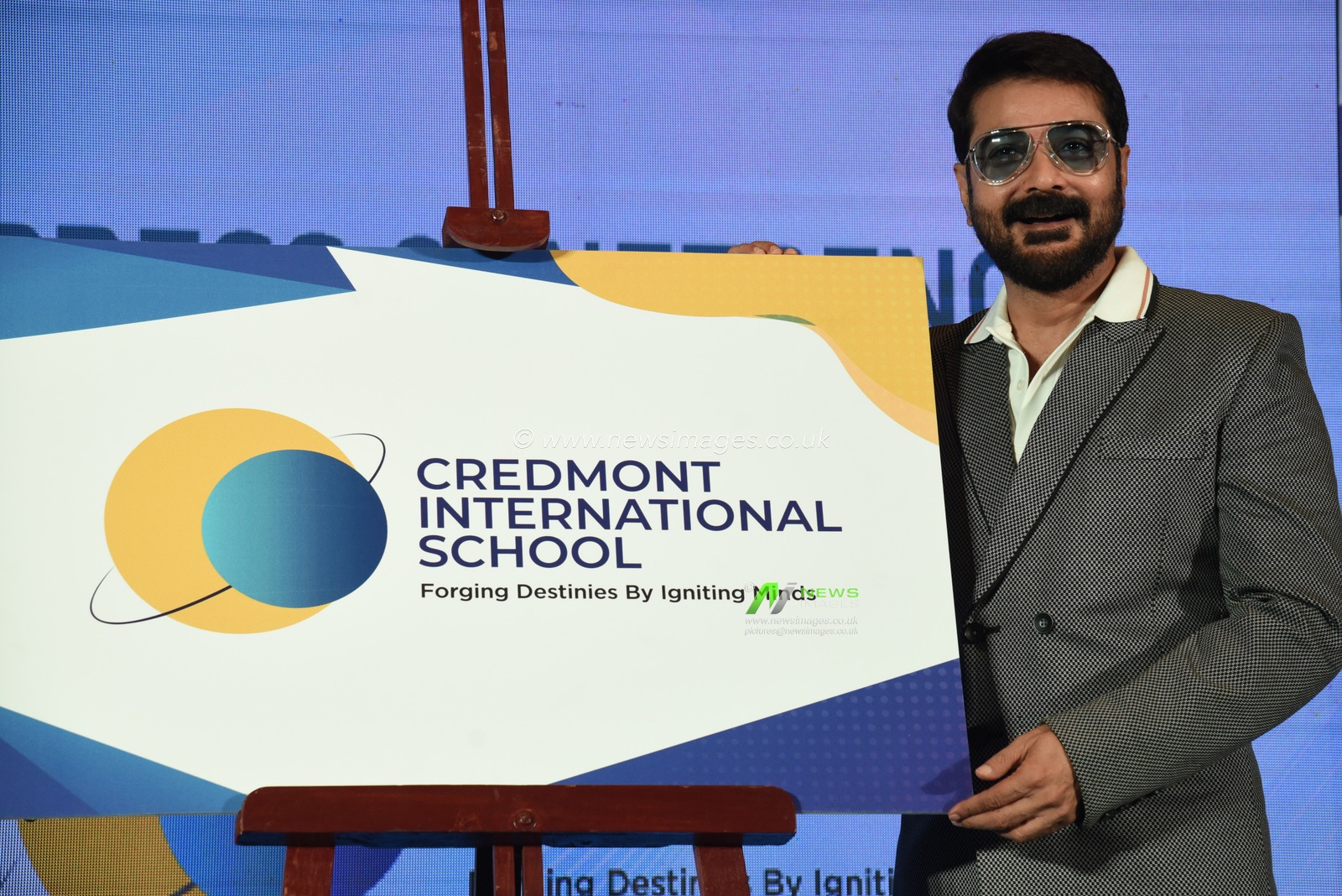 Indian Actor Prosenjit Chatterjee react at the media conferences during Credmont International School announced its entry into Kolkata, promising to redefine the cityâ€™s educational landscape. Located at Kolkata West International City, Howrah, the sprawling 3.3-acre campus is set to provide a world-class learning environment with cutting-edge facilities. What sets Credmont apart from other CBSE schools is its integration of advanced artificial intelligence (AI) technology into every aspect of teaching and learning. From AI-powered smartboards and interactive classrooms to AI-enabled labs, the school leverages cutting-edge tools to provide personalized learning experiences tailored to each student's needs. This innovation ensures a future-ready education, making Credmont a unique and forward-thinking choice for parents. The annual fee is â‚¹3,00,000, inclusive of all facilities and services.  In Kolkata on December 11,2024,Pictures by Debajyoti Chakraborty.(Photo: Debajyoti Chakraborty/News Images)