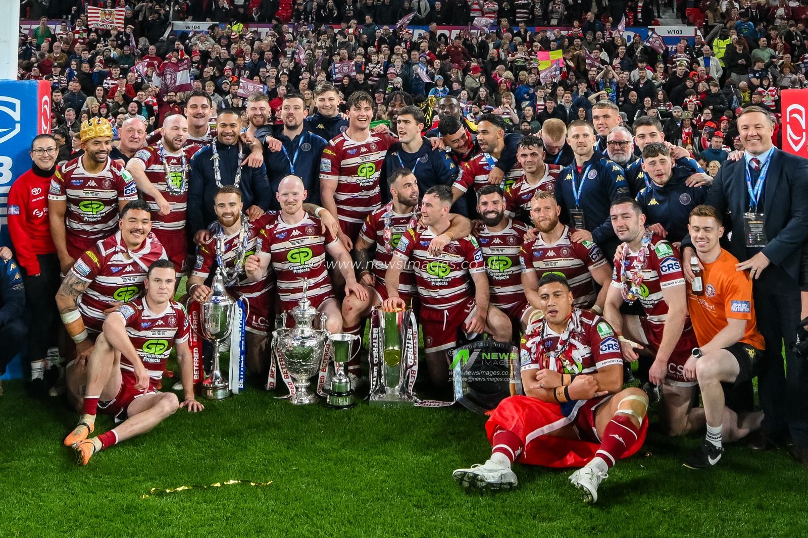 Wigan Warriors players and staff celebrate their victory with fans following the Betfred Super League Grand Final match Wigan Warriors vs Hull KR at Old Trafford, Manchester, United Kingdom, 12th October 2024

(Photo by Craig Thomas/News Images)