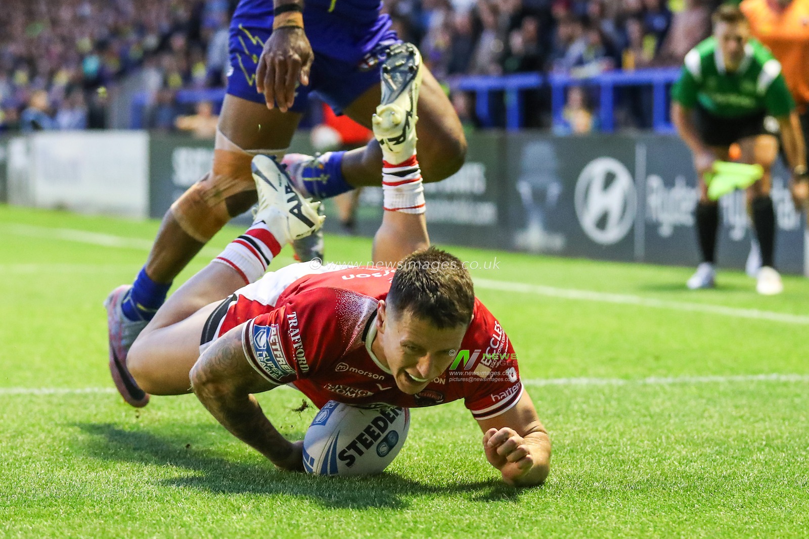Deon Cross of Salford Red Devils goes over for a try and makes the score 8-23 during the Betfred Super League Round 14 match Warrington Wolves vs Salford Red Devils at Halliwell Jones Stadium, Warrington, United Kingdom, 14th June 2024

(Photo by Gareth Evans/News Images)
