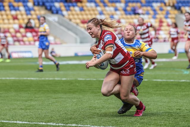 Grace Banks of Wigan Warriors goes over for a try during the Betfred Women's Challenge Cup Cup Semi-final match Leeds Rhinos vs Wigan Warriors at LNER Community Stadium, York, United Kingdom, 10th May 2025

(Photo by Alfie Cosgrove/News Images)