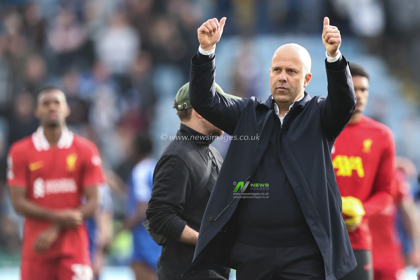 Arne Slot manager of Liverpool gestures to the away fans after the Premier League match Leicester City vs Liverpool at King Power Stadium, Leicester, United Kingdom, 20th April 2025

(Photo by Alfie Cosgrove/News Images)
