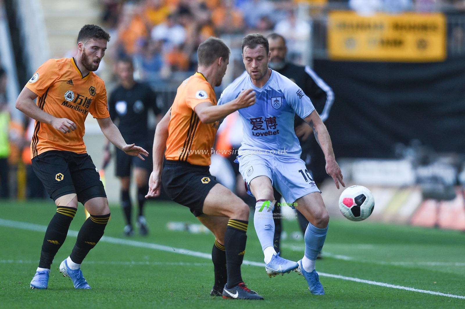 25th August 2019, Molineux Stadium, Wolverhampton, England ; Premier League Football, Wolverhampton Wanderers vs Burnley ; Ashley Barnes (10) of Burnley kicks the ball out whilst under pressure

Credit: Richard Long/News Images

English Football League images are subject to DataCo Licence