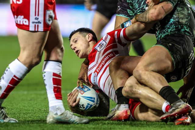 Deon Cross of St Helens is tackled during the Betfred Super League match St Helens vs Leigh Leopards at The BrewDog Stadium, St Helens, United Kingdom on 20 February 2026

(Photo by Alfie Cosgrove/News Images)