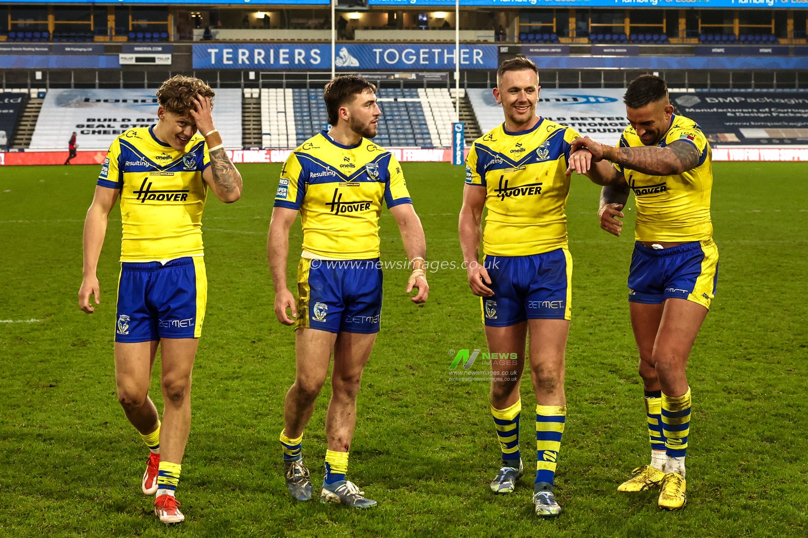 Arron Lindop Jordy, Crowther, Ben Currie and Paul Vaughan of Warrington Wolves celebrate their win during the Betfred Super League Round 1 match Huddersfield Giants vs Warrington Wolves at John Smith's Stadium, Huddersfield, United Kingdom, 16th February 2025

(Photo by Mark Cosgrove/News Images)
