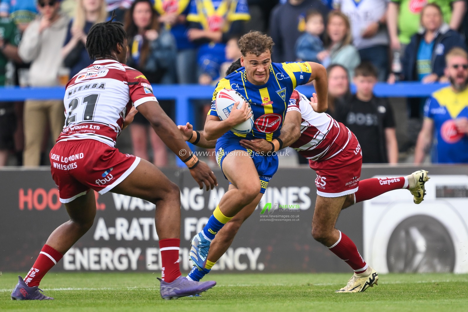 Cai Taylor-Wray of Warrington Wolves is tackled by Bevan French of Wigan Warriors during the Betfred Super League Round 13 match Warrington Wolves vs Wigan Warriors at Halliwell Jones Stadium, Warrington, United Kingdom, 1st June 2024

(Photo by Craig Thomas/News Images)
