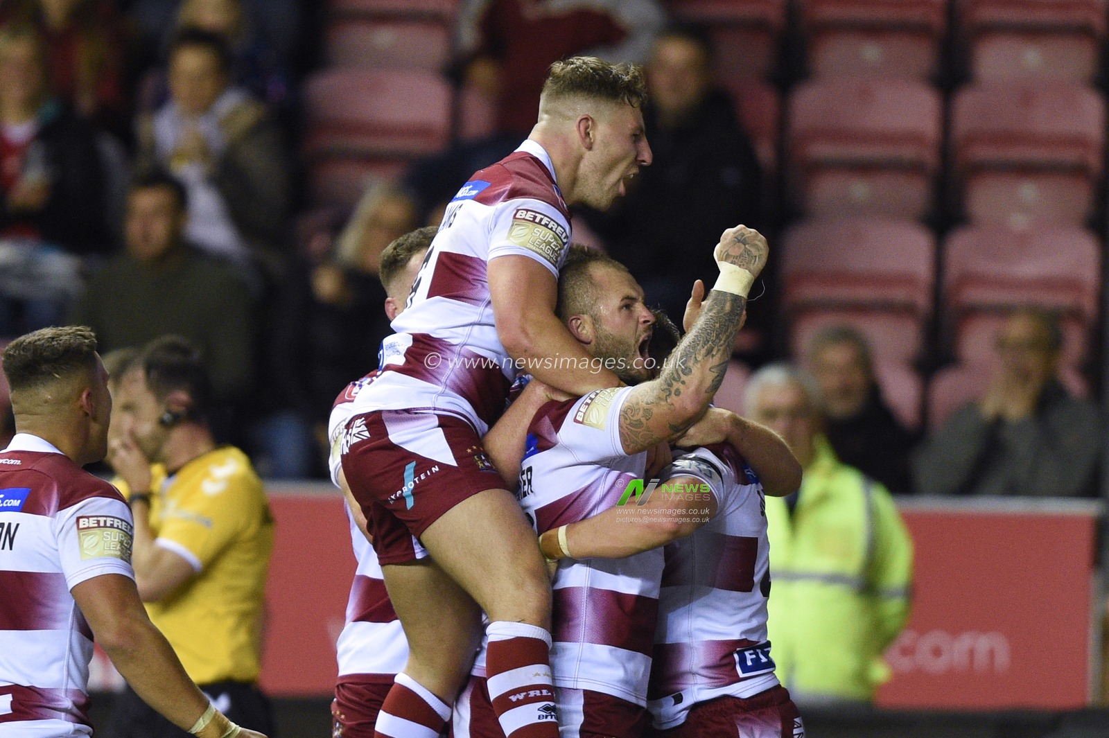 12th September 2019 , DW Stadium, Wigan, England;  Betfred Super League Rugby, Round 29, Wigan Warriors vs Castleford Tigers ; Oliver Gildart (4) of Wigan Warriors celebrates his try with team mates

Credit: Richard Long/News Images