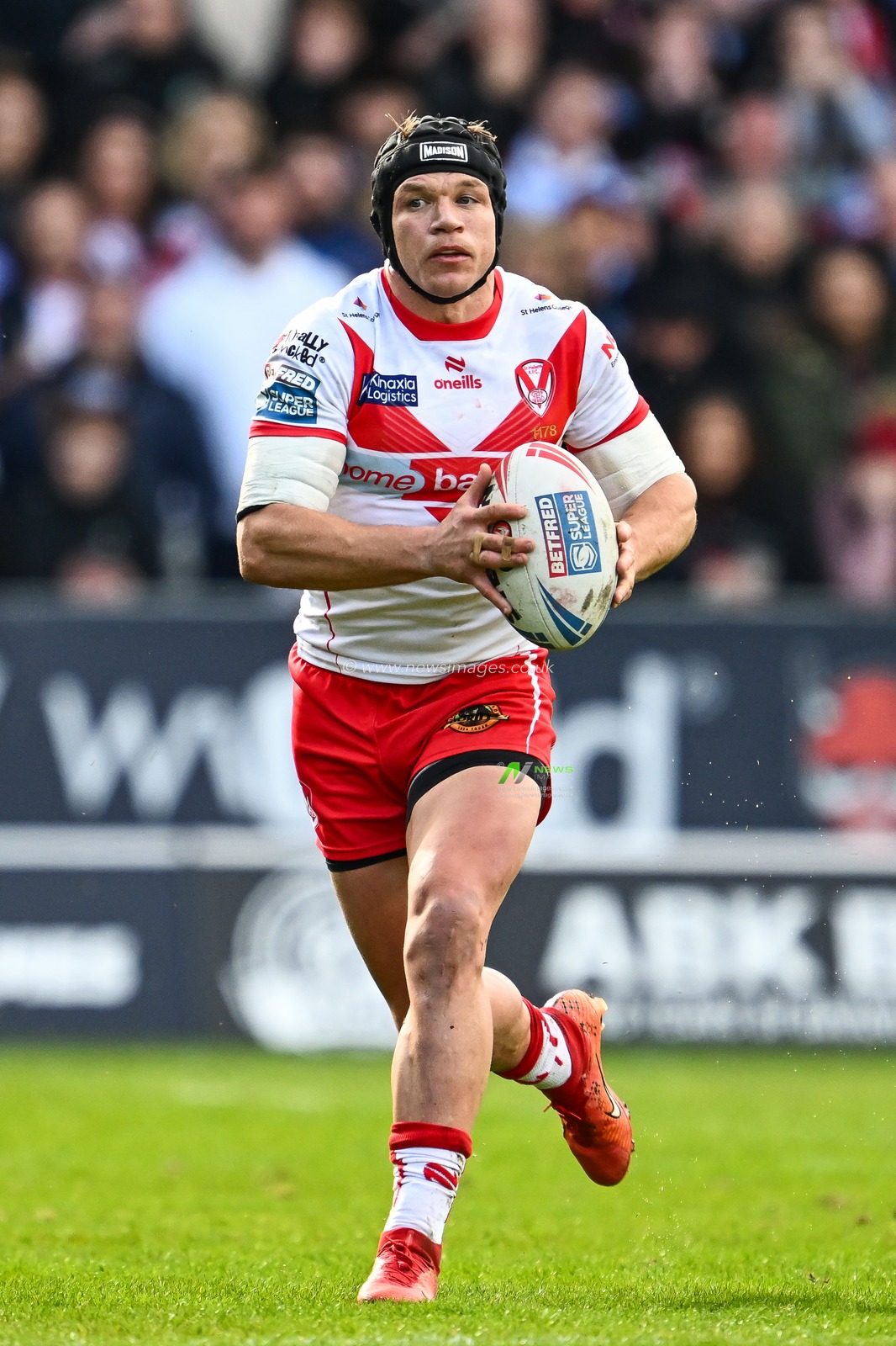 Jonny Lomax of St. Helens makes a break during the Betfred Super League Round 6 match St Helens vs Wigan Warriors at Totally Wicked Stadium, St Helens, United Kingdom, 29th March 2024

(Photo by Craig Thomas/News Images)