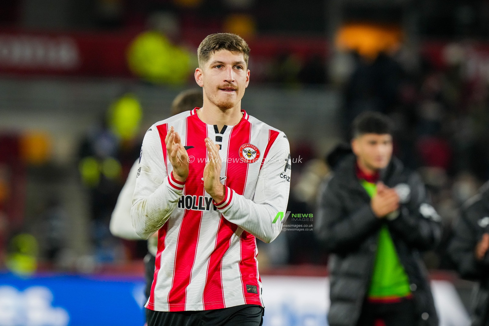 Vitaly Janelt of Brentford applauds the fans during the Premier League match Brentford vs Bournemouth at The Gtech Community Stadium, London, United Kingdom, 27th December 2025

(Photo by Maynard Manyowa/News Images)

*** GER AUT SUI OUT ***