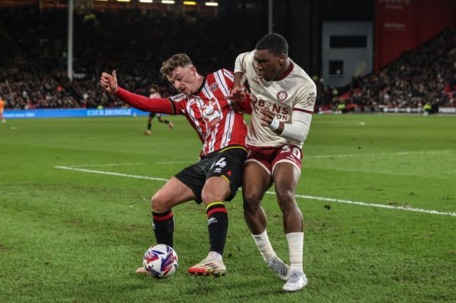 Harrison Burrows of Sheffield United and Sinclair Armstrong of Bristol City battle for the ball during the Sky Bet Championship match Sheffield United vs Bristol City at Bramall Lane, Sheffield, United Kingdom, 11th March 2025

(Photo by Alfie Cosgrove/News Images)