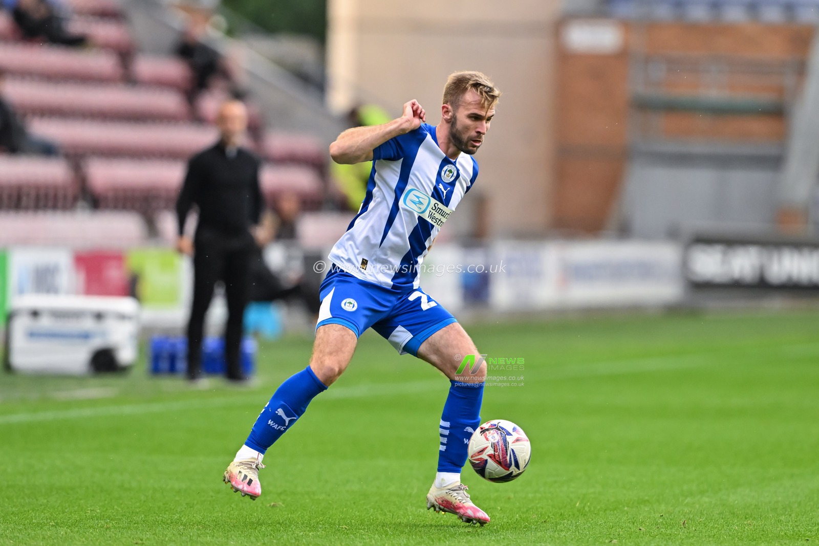 Callum McManaman of Wigan Athletic in action during the Bristol Street Motors Trophy match Wigan Athletic vs Morecambe at DW Stadium, Wigan, United Kingdom, 3rd September 2024

(Photo by Cody Froggatt/News Images)