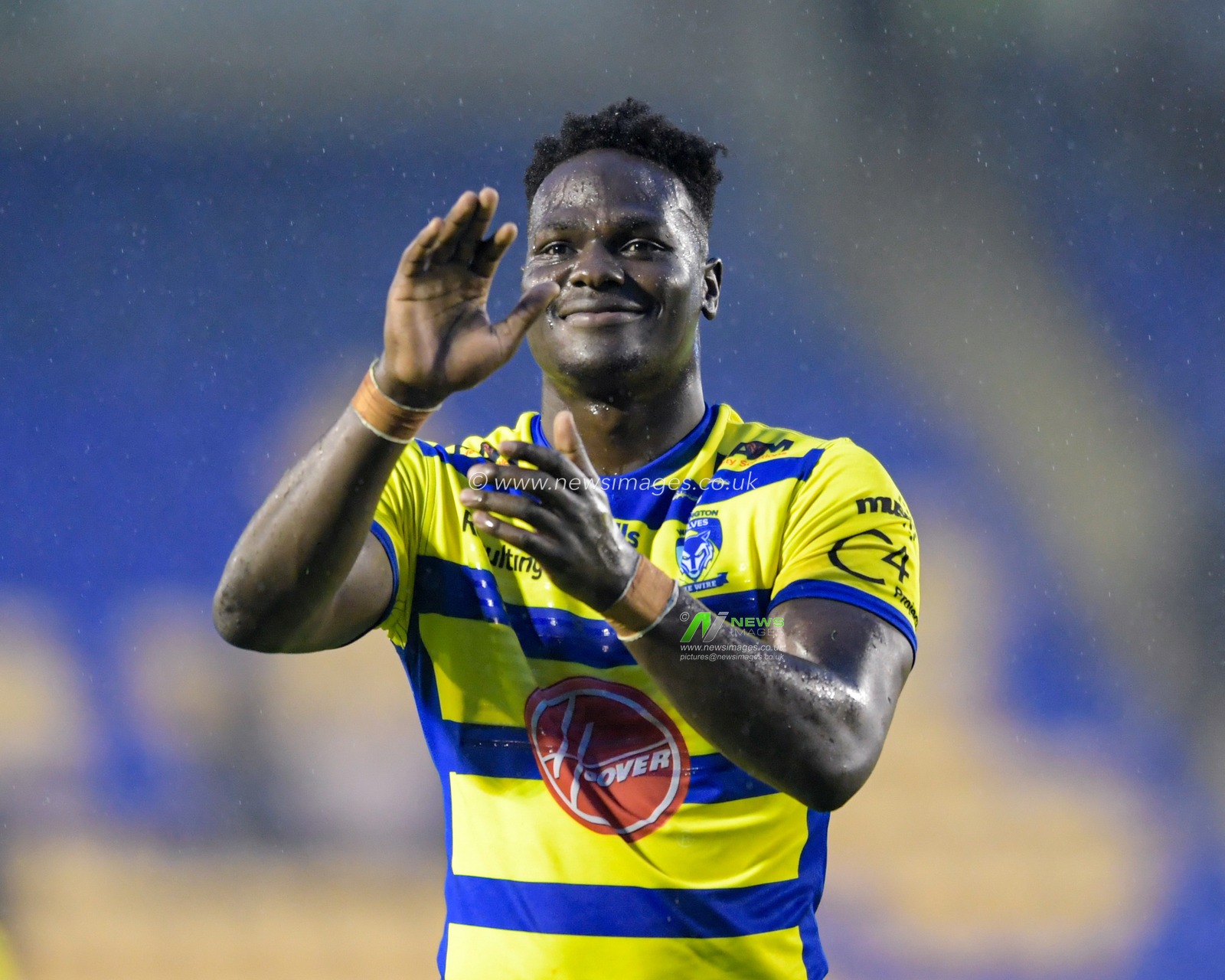 Eribe Doro (25) of Warrington Wolves applauds the home supporters at the end of the game