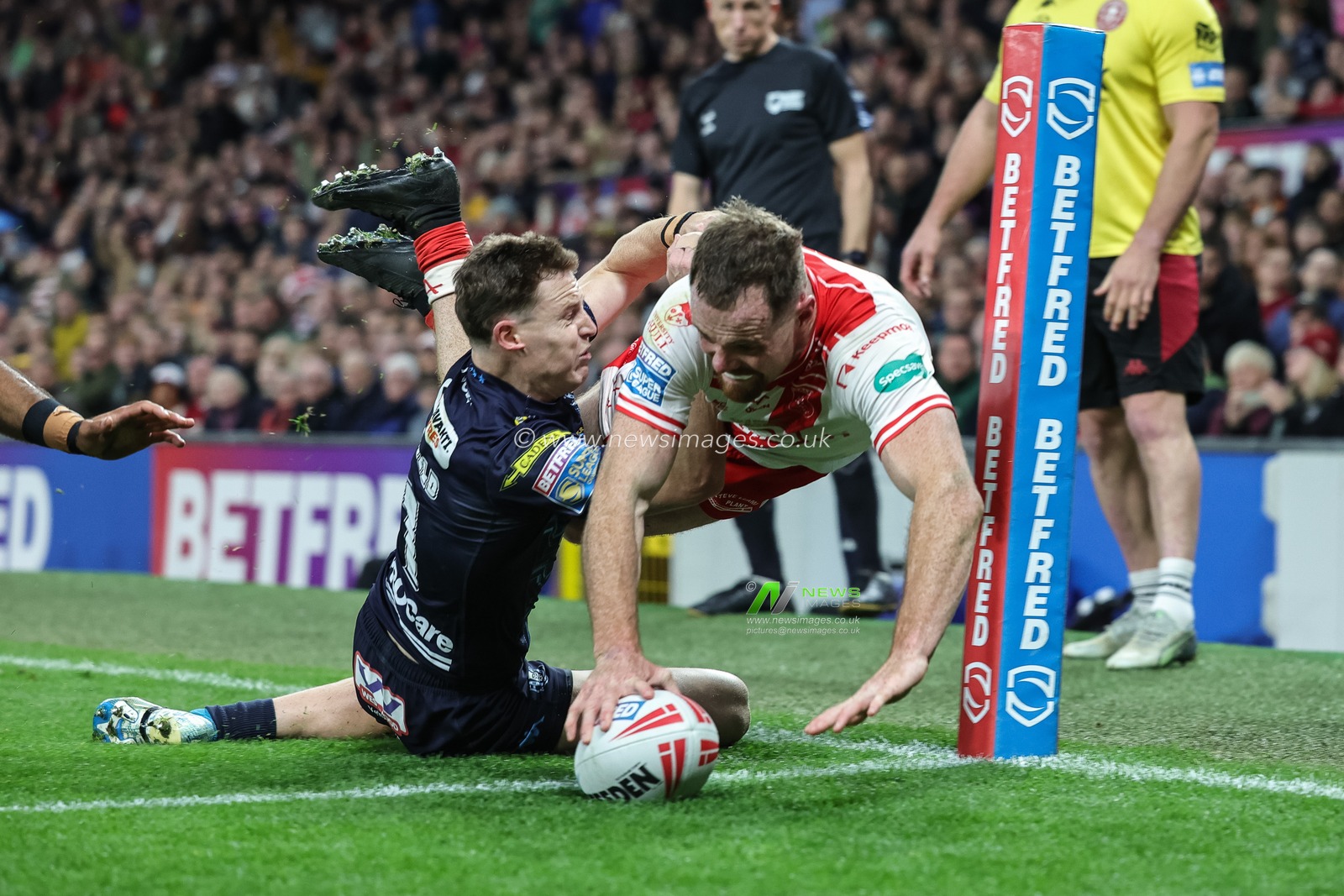 Joe Burgess of Hull KR goes over for a try during the 2025 Betfred Super League Grand Final Hull KR v Wigan Warriors at Old Trafford, Manchester, United Kingdom, 11th October 2025

(Photo by Mark Cosgrove/News Images)