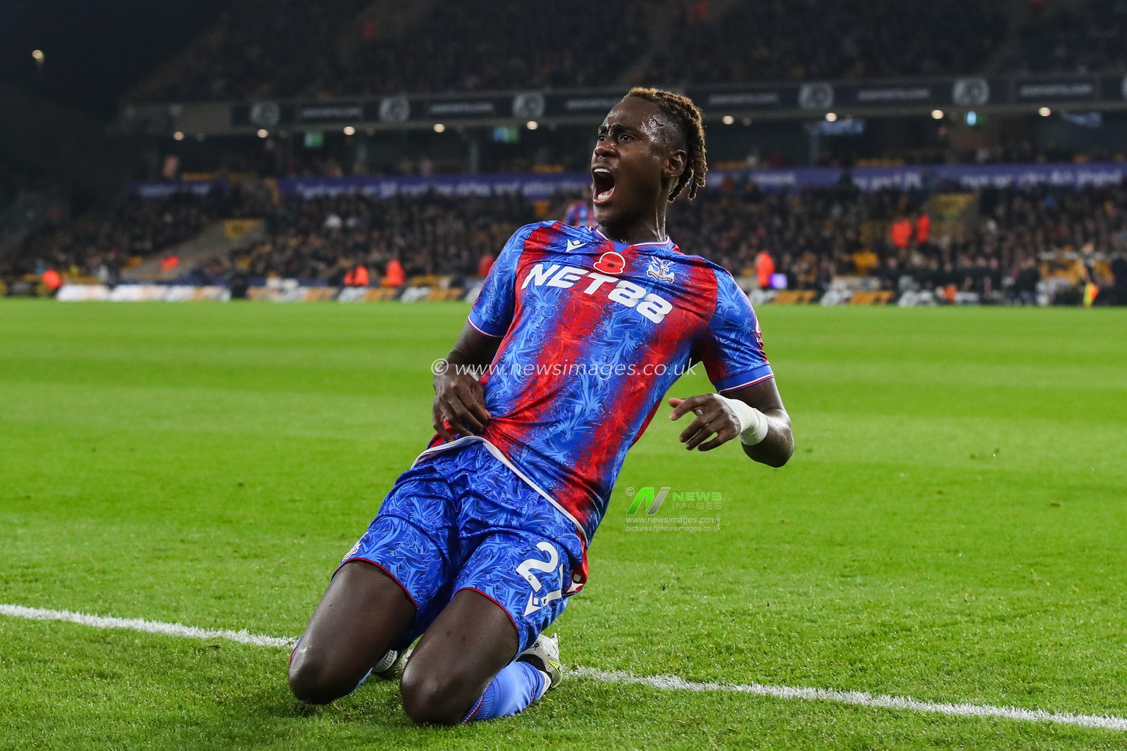 Trevoh Chalobah of Crystal Palace celebrates his goal to make it 0-1 during the Premier League match Wolverhampton Wanderers vs Crystal Palace at Molineux, Wolverhampton, United Kingdom, 2nd November 2024

(Photo by Gareth Evans/News Images)