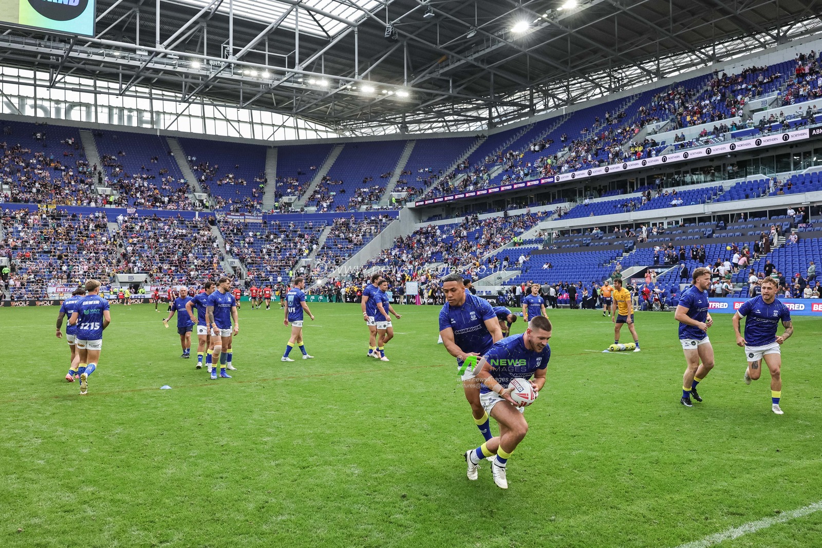 Warrington players in the pre-game warm up during the Betfred Super League Magic Weekend match Leigh Leopards vs Warrington Wolves at Hill Dickinson Stadium, Liverpool, United Kingdom on 04 July 2026

(Photo by Mark Cosgrove/News Images)