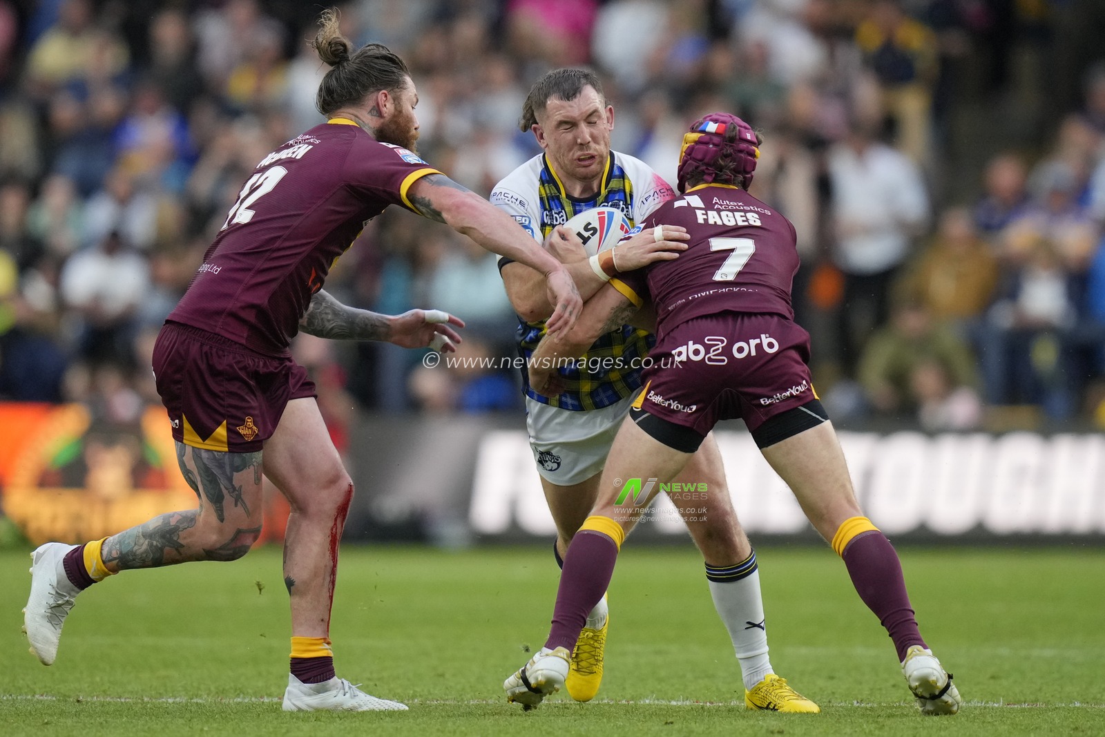 Cameron Smith #13 of Leeds Rhinos runs at Theo Fages #7 of Huddersfield Giants and Chris McQueen #12 of Huddersfield Giants during the Betfred Super League Round 16 match Leeds Rhinos vs Huddersfield Giants at Headingley Stadium, Leeds, United Kingdom, 23rd June 2023

(Photo by Steve Flynn/News Images)