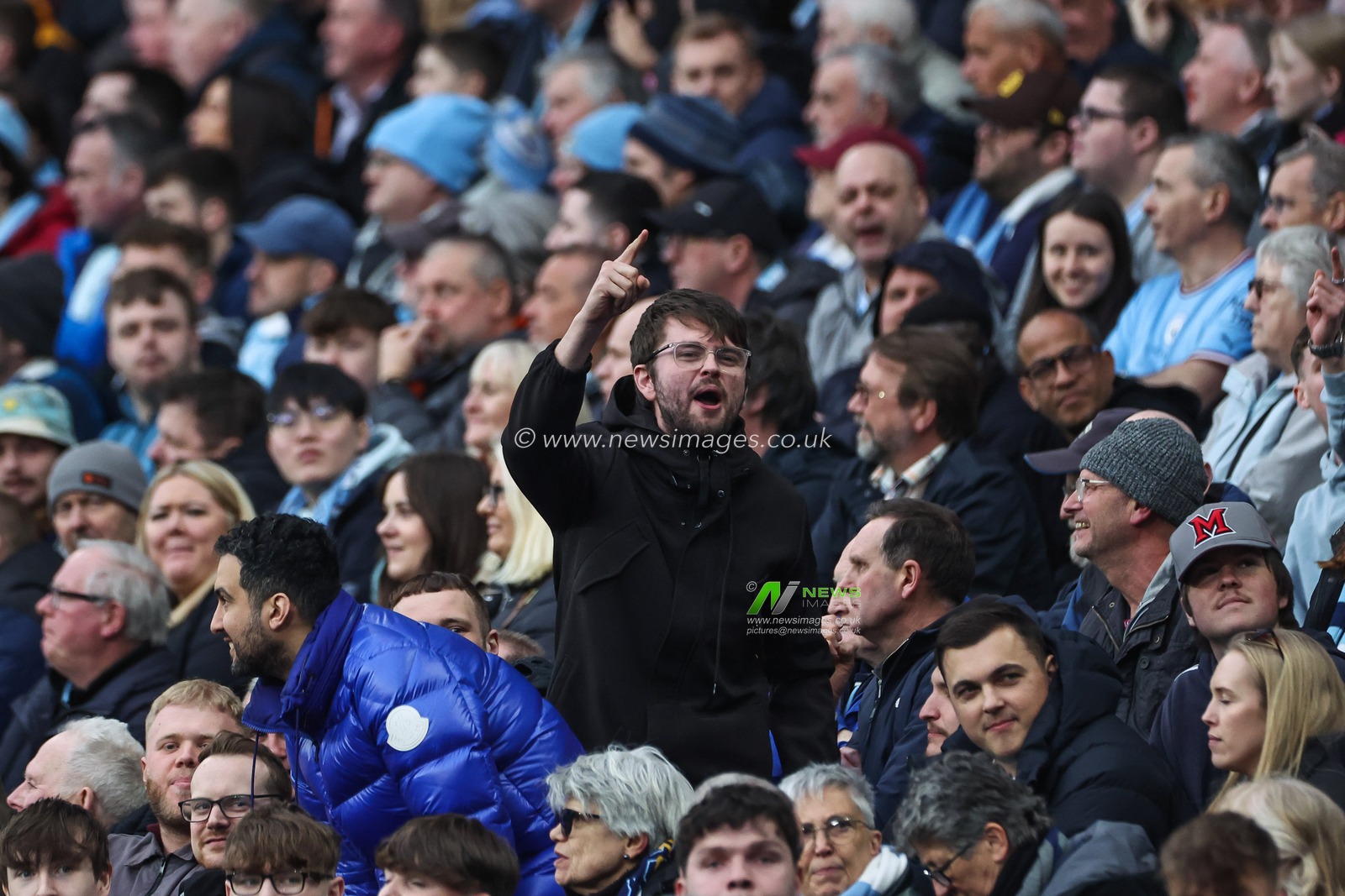 A fans chants during the Premier League match Manchester City vs Arsenal at Etihad Stadium, Manchester, United Kingdom, 31st March 2024

(Photo by Mark Cosgrove/News Images)