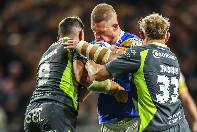 Tom Holroyd of Leeds Rhinos is tackled by Benjamin Garcia of Catalan Dragons during the Betfred Super League round 26 match Leeds Rhinos vs Catalans Dragons at Headingley Stadium, Leeds, United Kingdom, 11th September 2025

(Photo by Alfie Cosgrove/News Images)