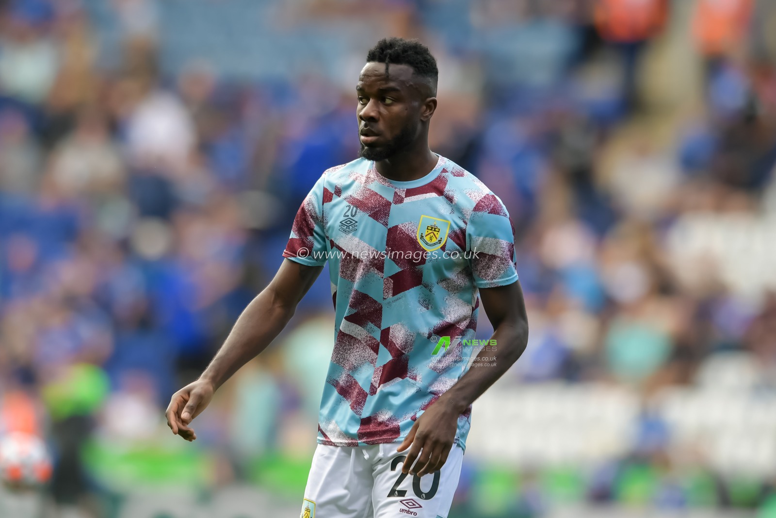 Maxwel Cornet #20 of Burnley warming up before the game