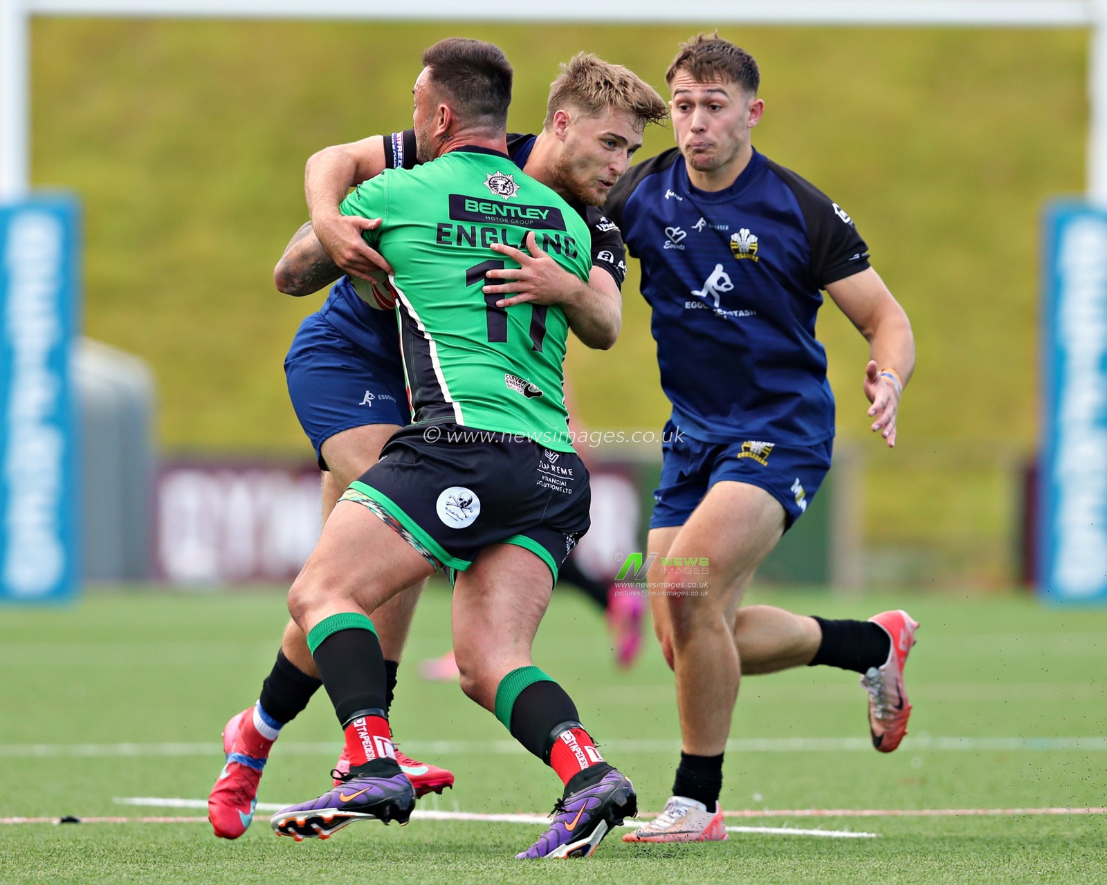Toby Hughes of North Wales Crusaders tackles Brad England of Keighley Cougars during the Betfred League 1 match North Wales Crusaders vs Keighley Cougars at Stadiwm CSM, Colwyn Bay, United Kingdom, 31st August 2025(Photo by Sam Eaden/News Images)