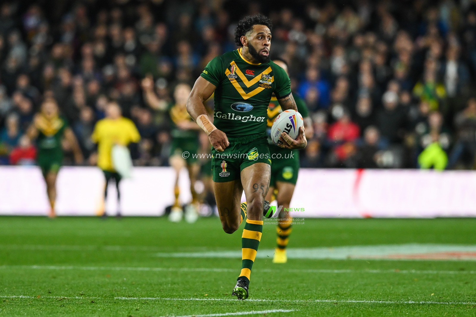 Josh Addo-Carr of Australia makes a break to score a try during the Rugby League World Cup 2021 match Australia vs Fiji at Headingley Stadium, Leeds, United Kingdom, 15th October 2022

(Photo by Craig Thomas/News Images)