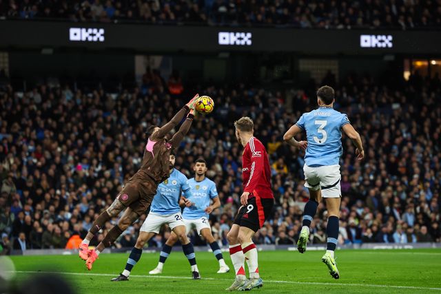 Ederson of Manchester City claims the cross during the Premier League match Manchester City vs Manchester United at Etihad Stadium, Manchester, United Kingdom, 15th December 2024

(Photo by Mark Cosgrove/News Images)