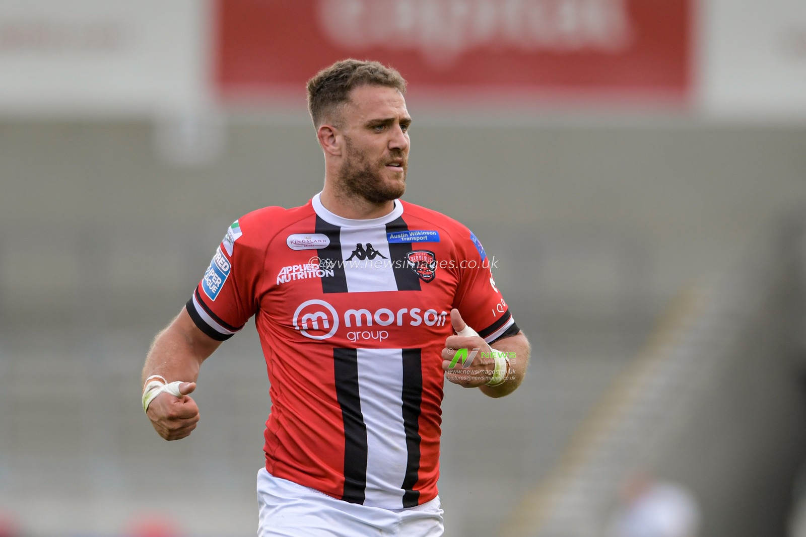 Lee Mossop (8) of Salford Red Devils in action during the game
