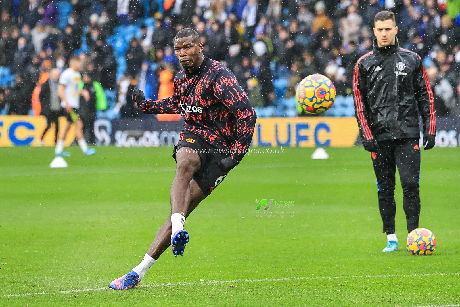 Paul Pogba #6 of Manchester United shoots on goal during the pre-game warmup