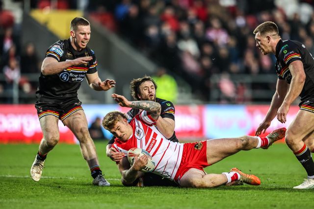 George Delaney of St Helens is tackled by Joe Mellor of Bradford Bulls during the Betfred Super League round 4 match St Helens vs Bradford Bulls at The BrewDog Stadium, St Helens, United Kingdom on 07 March 2026

(Photo by Alfie Cosgrove/News Images)