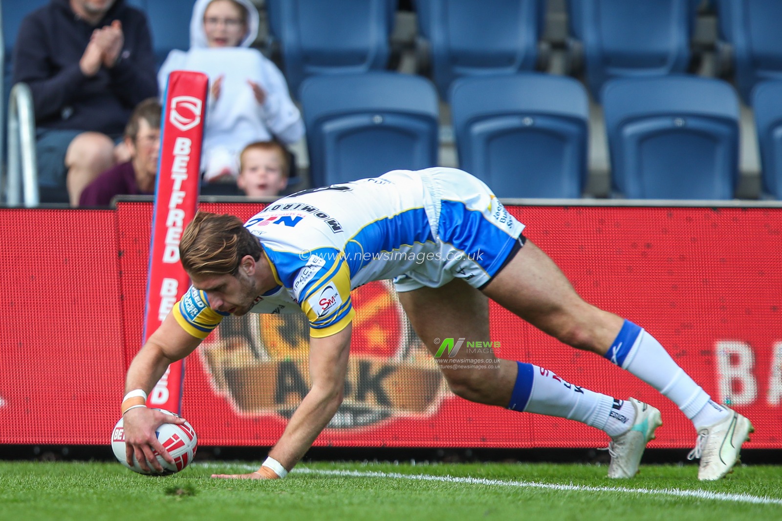 Paul Momirovski of Leeds Rhinos goes over for a try and makes the score 8-6 during the Betfred Super League Round 16 match Leeds Rhinos vs London Broncos at Headingley Stadium, Leeds, United Kingdom, 6th July 2024

(Photo by Gareth Evans/News Images)