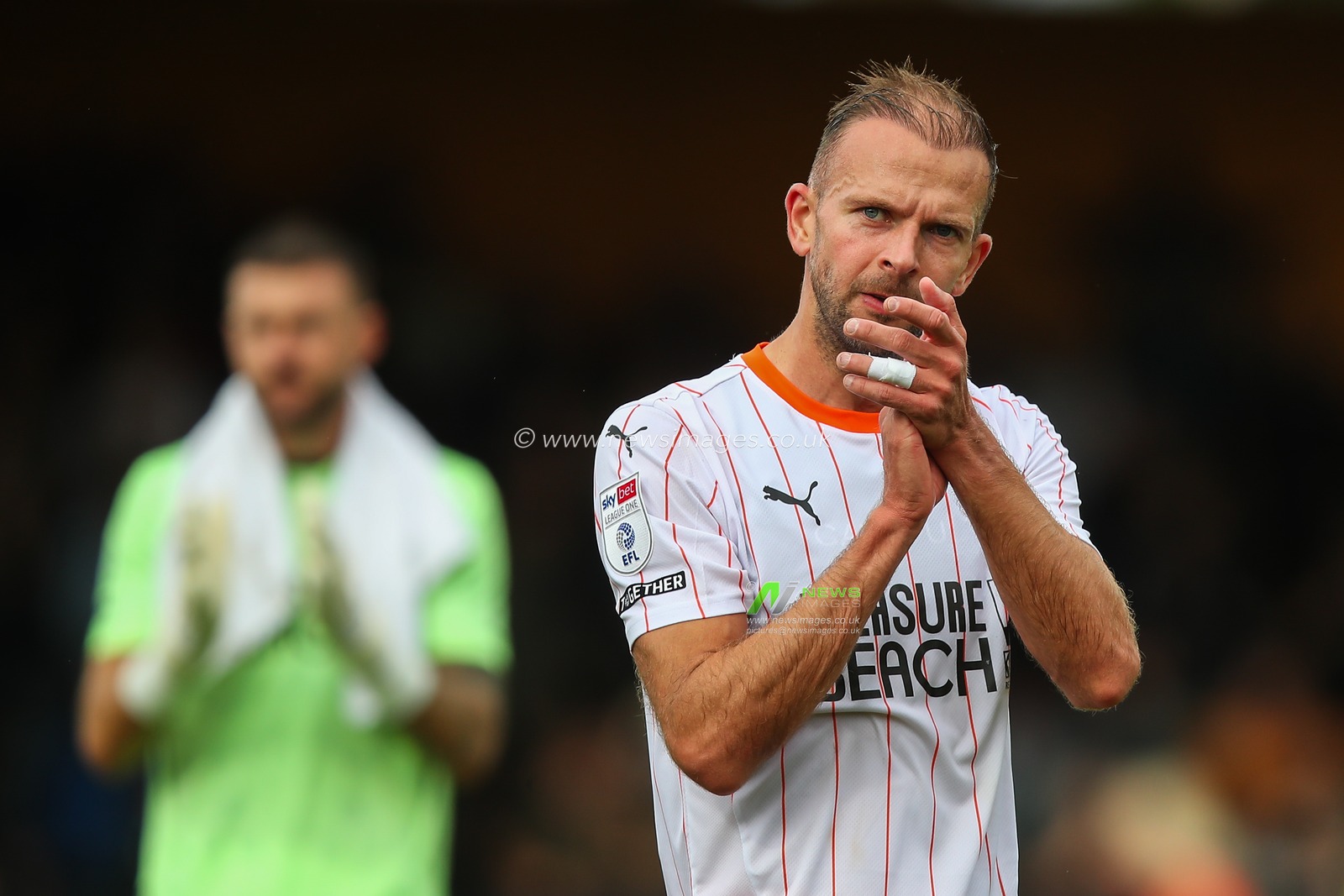 Jordan Rhodes of Blackpool applauds the travelling fans after the Sky Bet League 1 match Cambridge United vs Blackpool at Abbey Stadium, Cambridge, United Kingdom, 24th August 2024

(Photo by Gareth Evans/News Images)