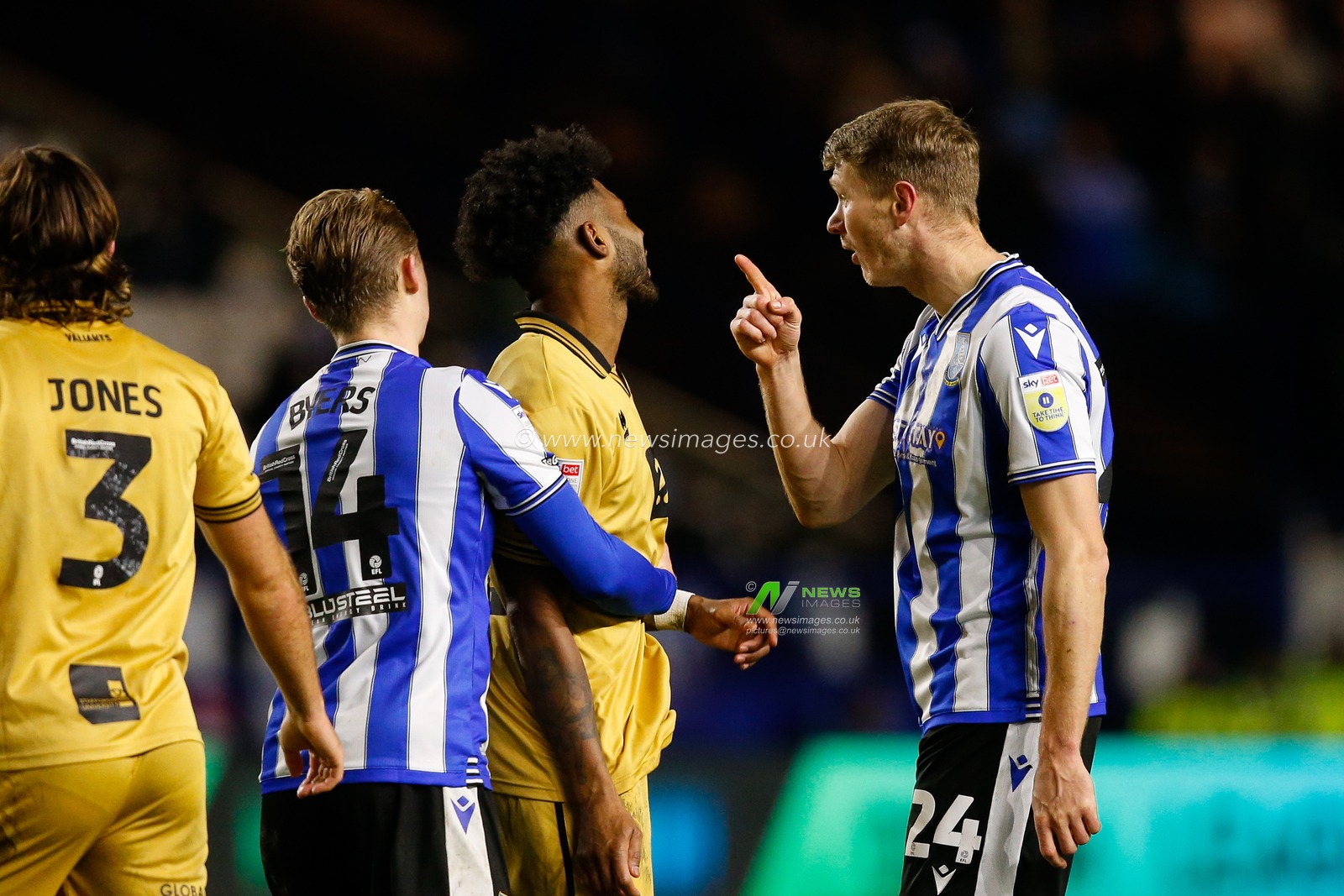 Michael Smith #24 of Sheffield Wednesday clashes with Ellis Harrison #22 of Port Vale during the Sky Bet League 1 match Sheffield Wednesday vs Port Vale at Hillsborough, Sheffield, United Kingdom, 29th December 2022

(Photo by Ben Early/News Images)