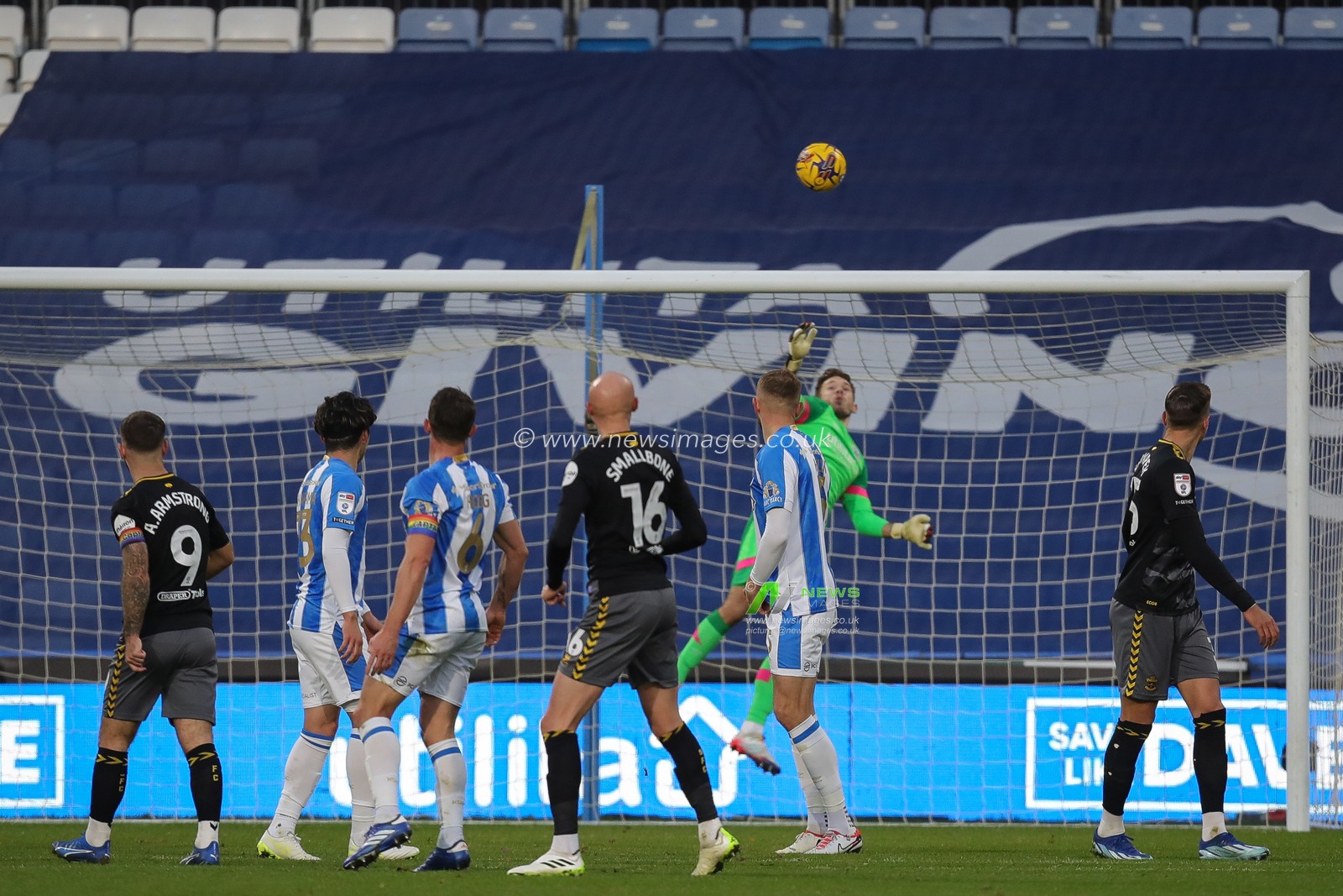 Chris Maxwell #12 of Huddersfield Town with a finger tip save during the Sky Bet Championship match Huddersfield Town vs Southampton at John Smith's Stadium, Huddersfield, United Kingdom, 25th November 2023

(Photo by James Heaton/News Images)