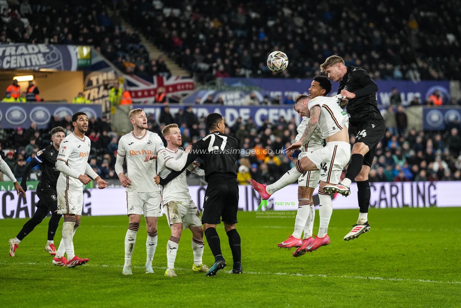 Michael Smith of Sheffield Wednesday wins a header during the Sky Bet Championship match Swansea City vs Sheffield Wednesday at Swansea.com Stadium, Swansea, United Kingdom, 12th February 2025

(Photo by Andrew Lewis/News Images)