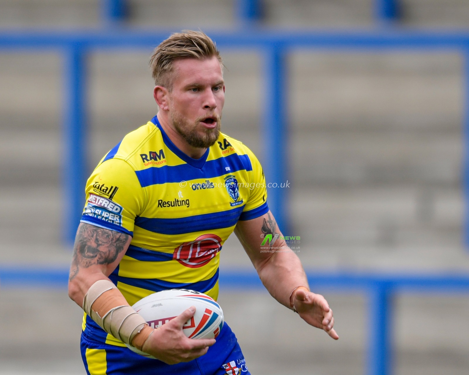 Mike Cooper (10) of Warrington Wolves in action during the game