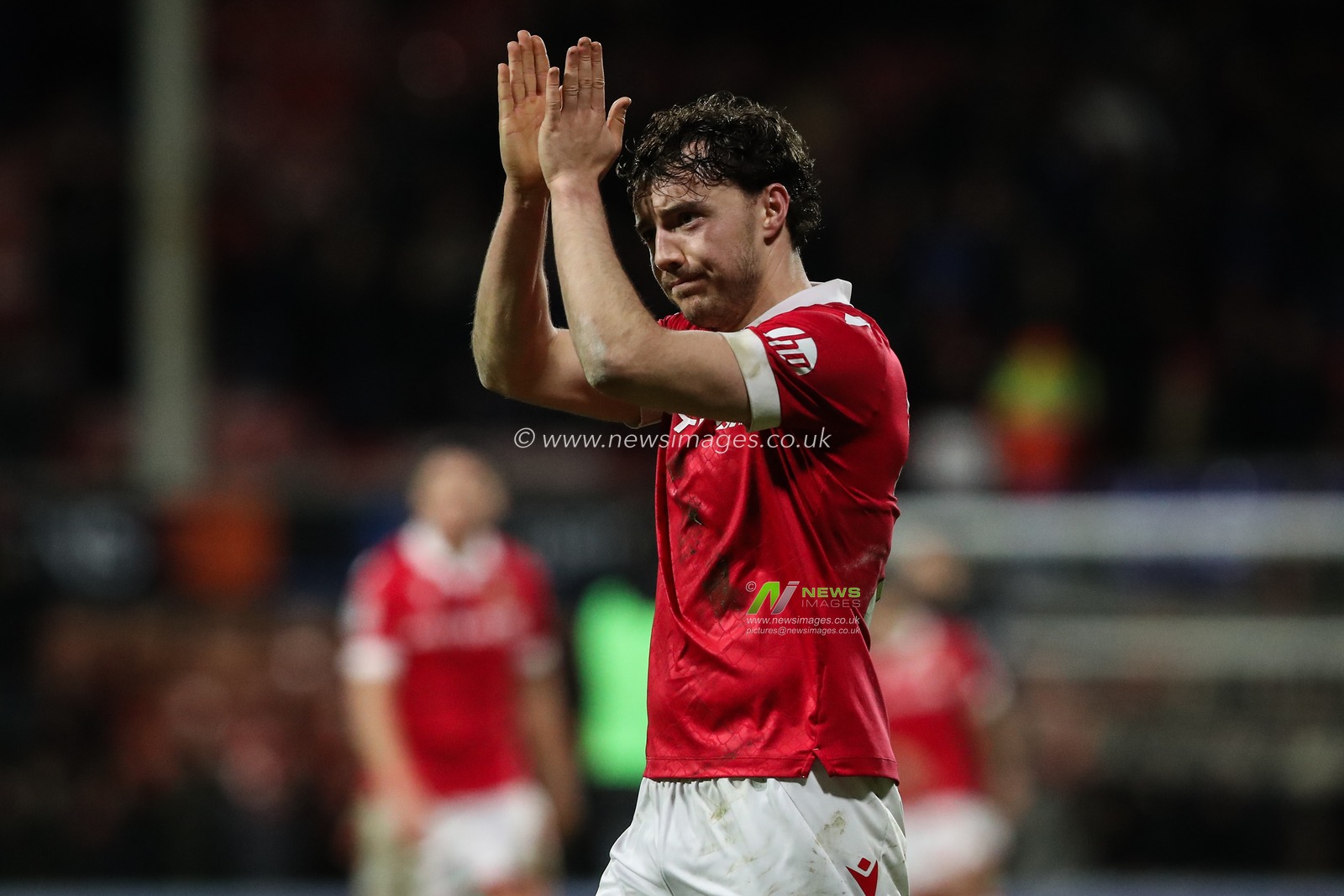 Ollie Rathbone of Wrexham applauds the home fans after the Sky Bet League 1 match Wrexham vs Birmingham City at SToK Cae Ras, Wrexham, United Kingdom, 23rd January 2025

(Photo by Gareth Evans/News Images)