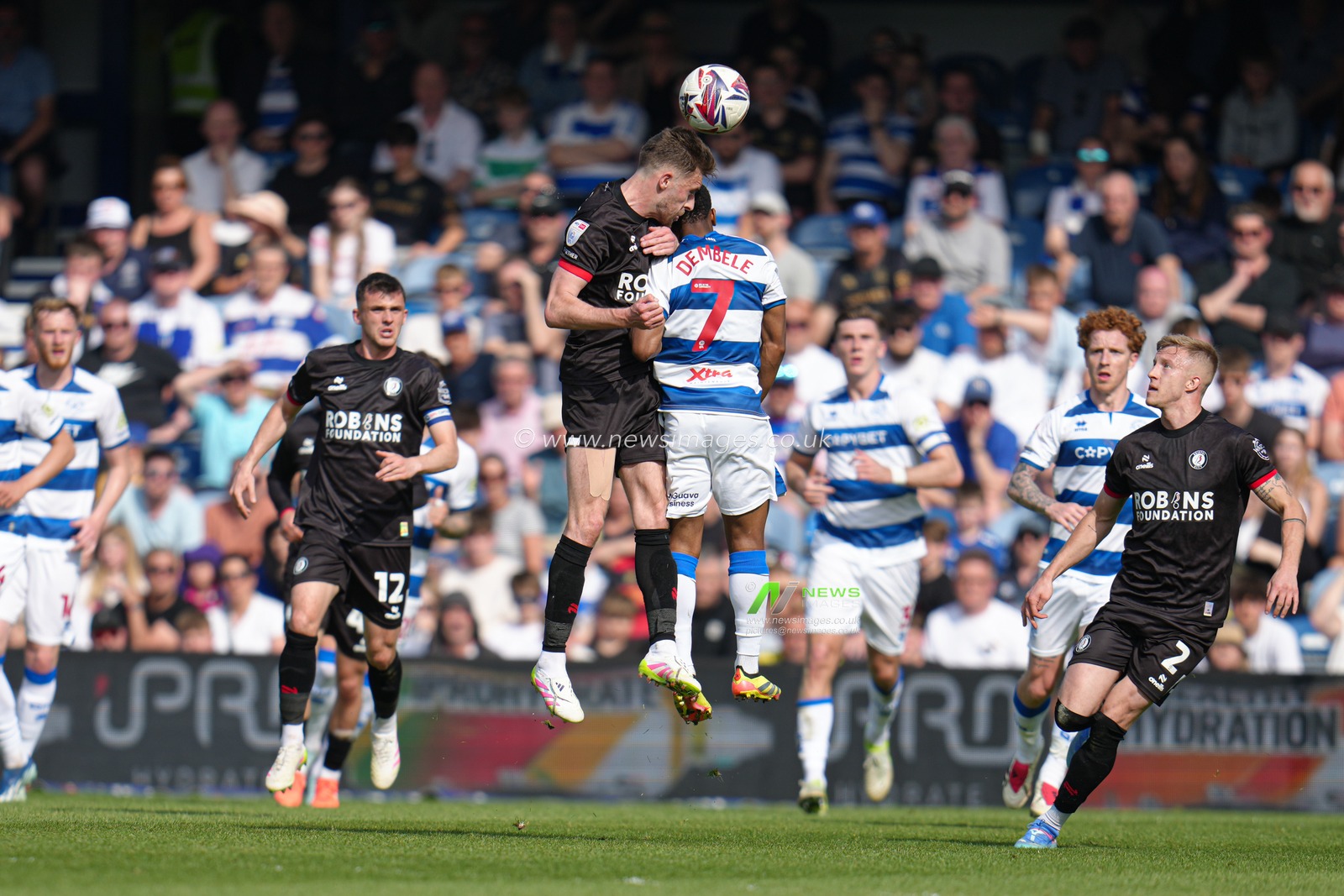 Both sets of players battle for header during the Sky Bet Championship match Queens Park Rangers vs Bristol City at Kiyan Prince Foundation Stadium, London, United Kingdom, 12th April 2025

(Photo by Harvey Murphy/News Images)