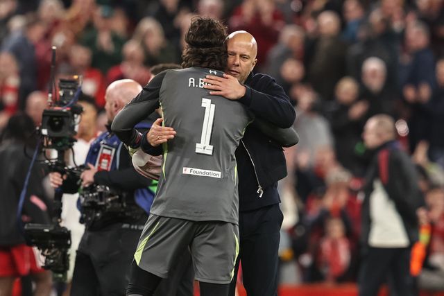 Arne Slot manager of Liverpool em braces Liverpool goalkeeper Alisson Becker after the win during the UEFA Champions League last 16 second leg match Liverpool vs Galatasaray at Anfield, Liverpool, United Kingdom on 18 March 2026

(Photo by Alfie Cosgrove/News Images)
