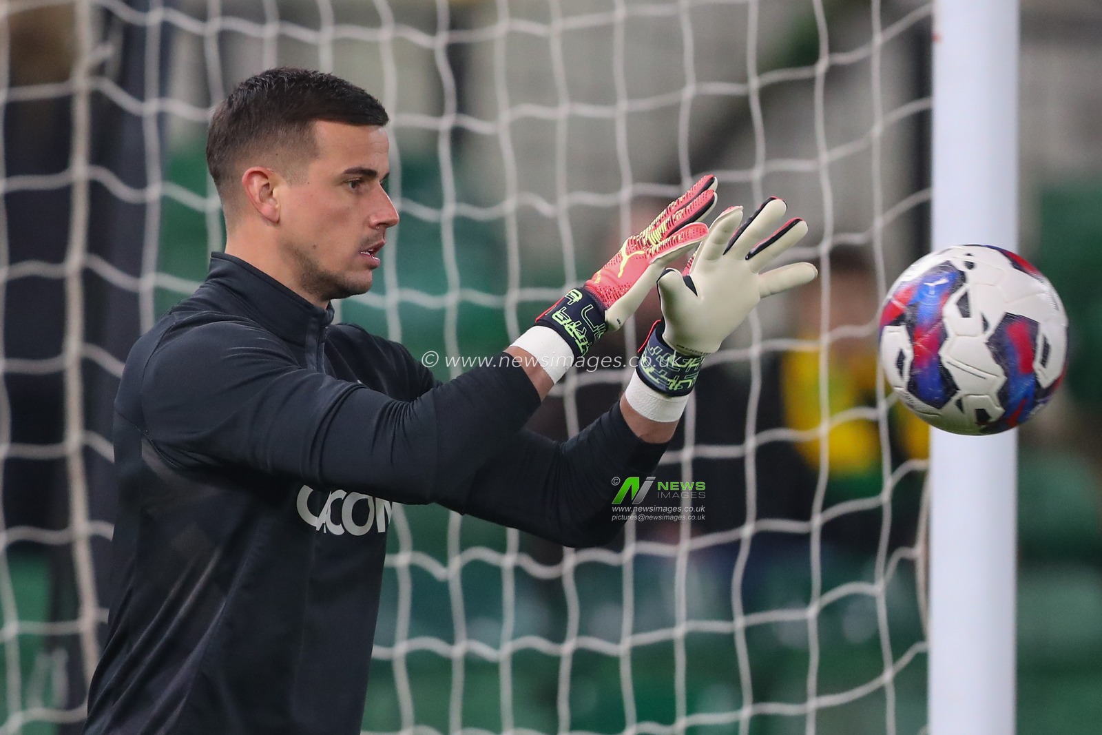 Karl Darlow #12 of Hull City during the pre-game warm up ahead of the Sky Bet Championship match Norwich City vs Hull City at Carrow Road, Norwich, United Kingdom, 14th February 2023

(Photo by Gareth Evans/News Images)
