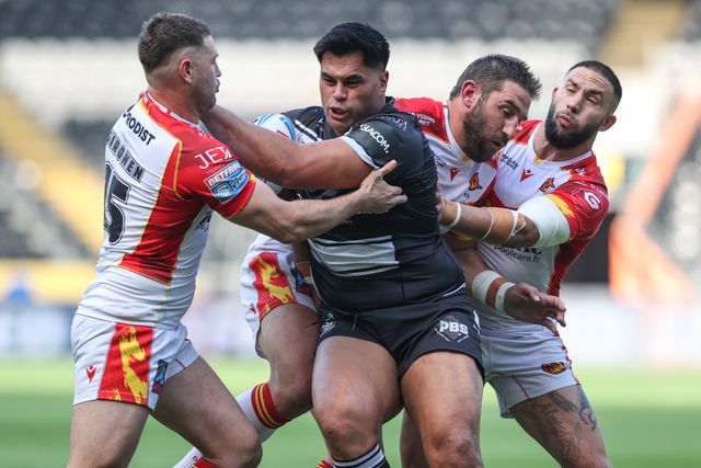 Herman Eseâ€™ese of Hull FC is tackled by Bayley Sironen of Catalan Dragons, Ben Garcia of Catalan Dragons and Julian Bousquet of Catalan Dragons during the Betfred Super League Round 27 match Hull FC vs Catalans Dragons at MKM Stadium, Hull, United Kingdom, 21st September 2024

(Photo by Alfie Cosgrove/News Images)