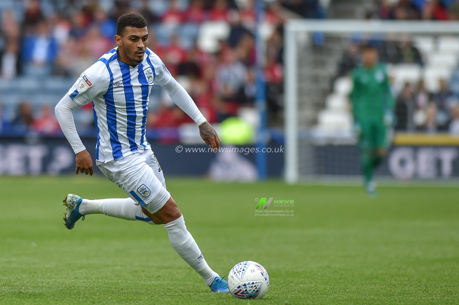 5th October 2019, John Smith's Stadium, Huddersfield, England; Sky Bet Championship, Huddersfield Town v Hull City :Karlan Grant (16) of Huddersfield Town makes an attacking run.
Credit: Dean Williams/News Images