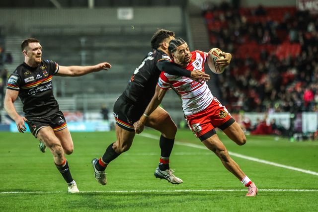 Lewis Murphy of St Helens is tackled by Esan Marsters of Bradford Bulls during the Betfred Super League round 4 match St Helens vs Bradford Bulls at The BrewDog Stadium, St Helens, United Kingdom on 07 March 2026

(Photo by Alfie Cosgrove/News Images)