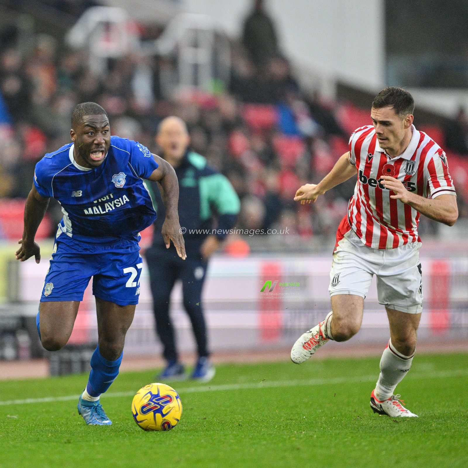 Yakou MÃ©Ã¯te 22# of Cardiff City Association Football Club drives the ball forward while under pressure from Michael Rose 5# of Stoke City Football Club, during the Sky Bet Championship match Stoke City vs Cardiff City at Bet365 Stadium, Stoke-on-Trent, United Kingdom, 4th November 2023

(Photo by Cody Froggatt/News Images)