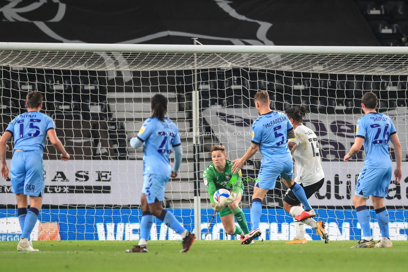 Ben Wilson #13 of Coventry City makes a save