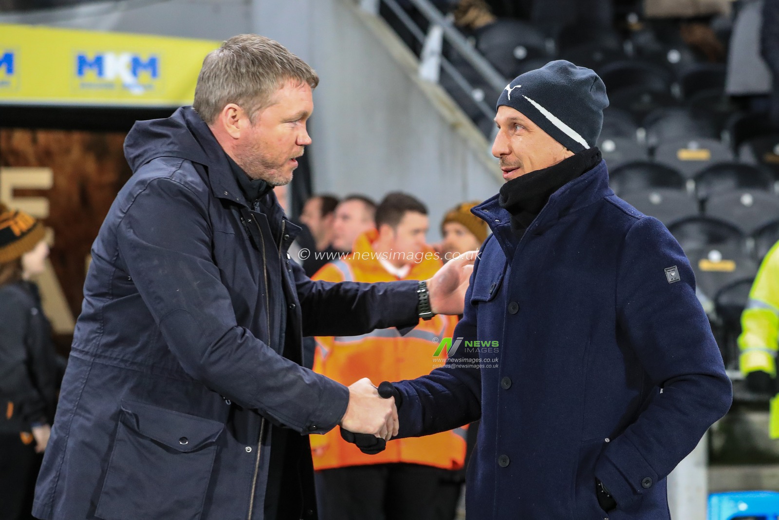 26th February 2020, KC Stadium, Kingston upon Hull, England; Sky Bet Championship, Hull City v Barnsley : Grant McCann manager of Hull City welcomes Gerhard Struber manager of Barnsley FC