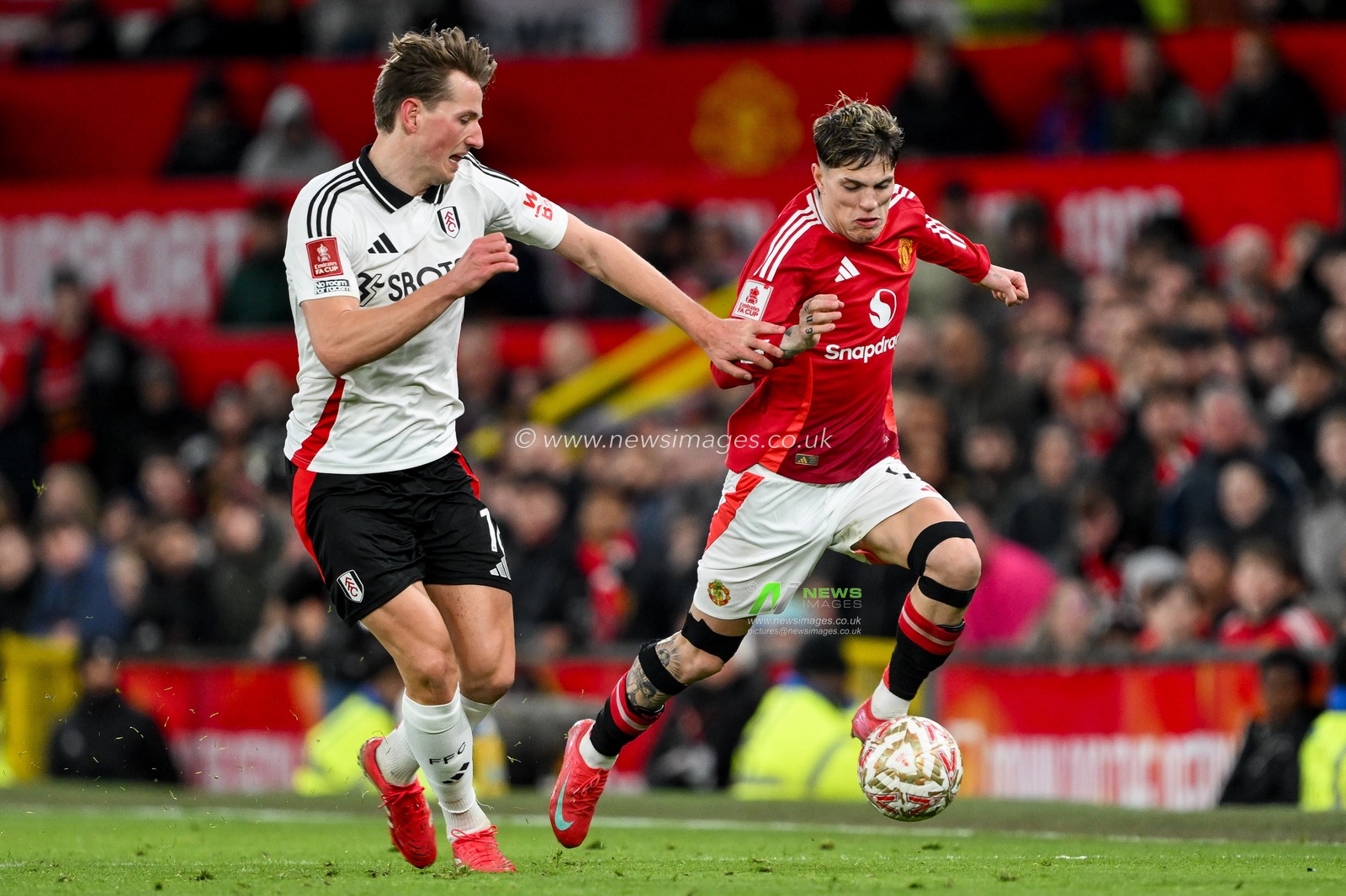 Alejandro Garnacho of Manchester United is put under pressure by Sander Berge of Fulham during the Emirates FA Cup 5th Round match Manchester United vs Fulham at Old Trafford, Manchester, United Kingdom, 2nd March 2025

(Photo by Craig Thomas/News Images)