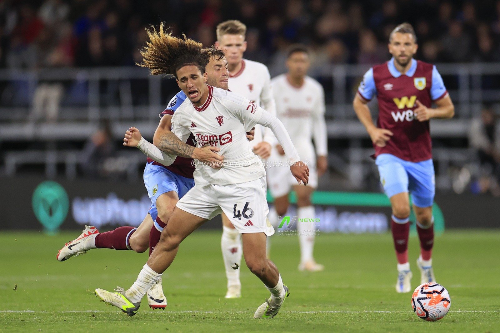 Hannibal Mejbri #46 of Manchester Unitedis held back by Jordan Beyer #5 of Burnley during the Premier League match Burnley vs Manchester United at Turf Moor, Burnley, United Kingdom, 23rd September 2023

(Photo by Conor Molloy/News Images)