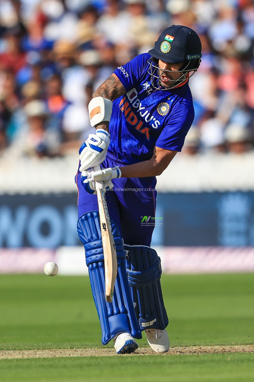Shikhar Dhawan of India hits a four (4)