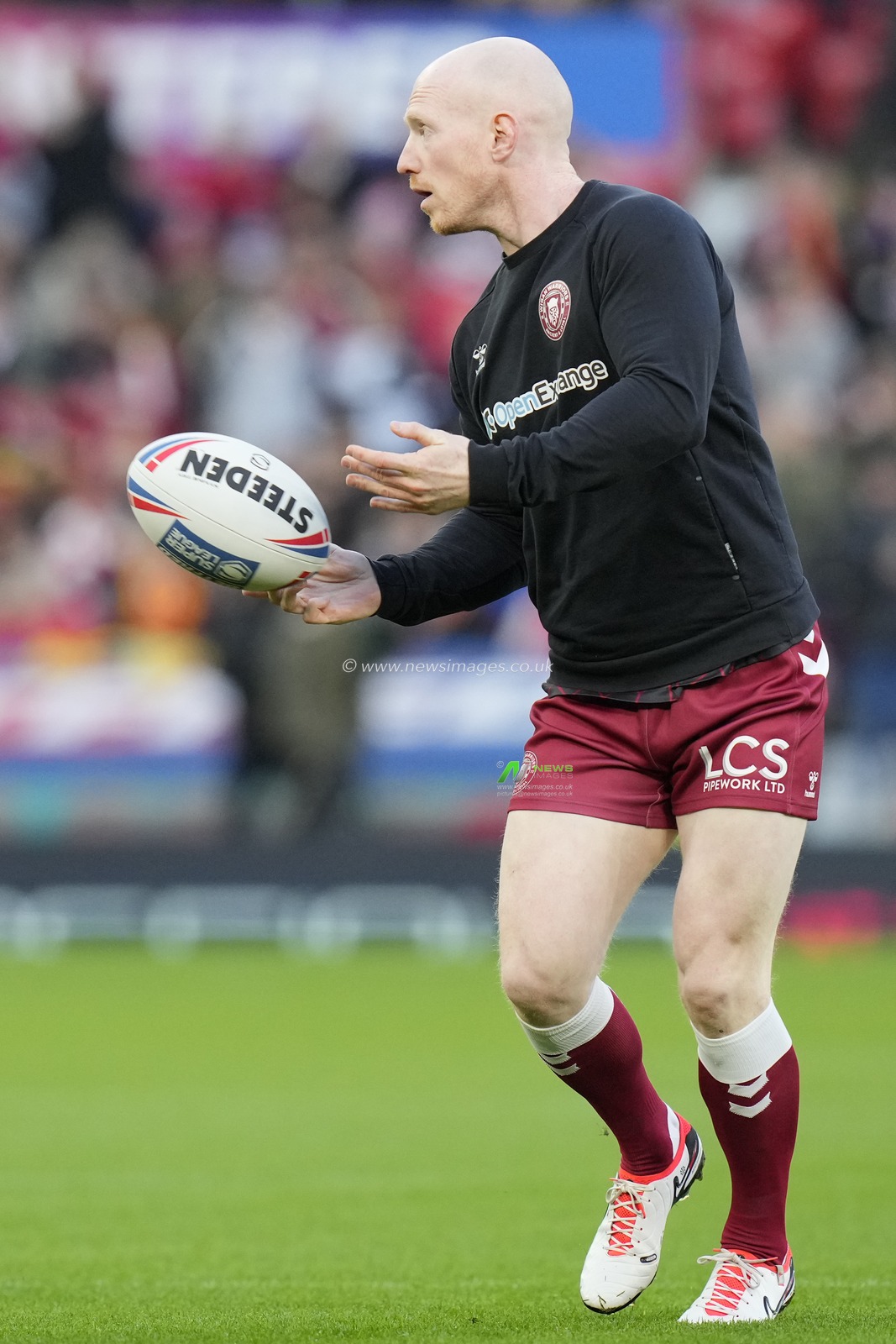 Liam Farrell #12 of Wigan Warriors warms up before the Betfred Super League Grand Final match Wigan Warriors vs Catalans Dragons at Old Trafford, Manchester, United Kingdom, 14th October 2023

(Photo by Steve Flynn/News Images)